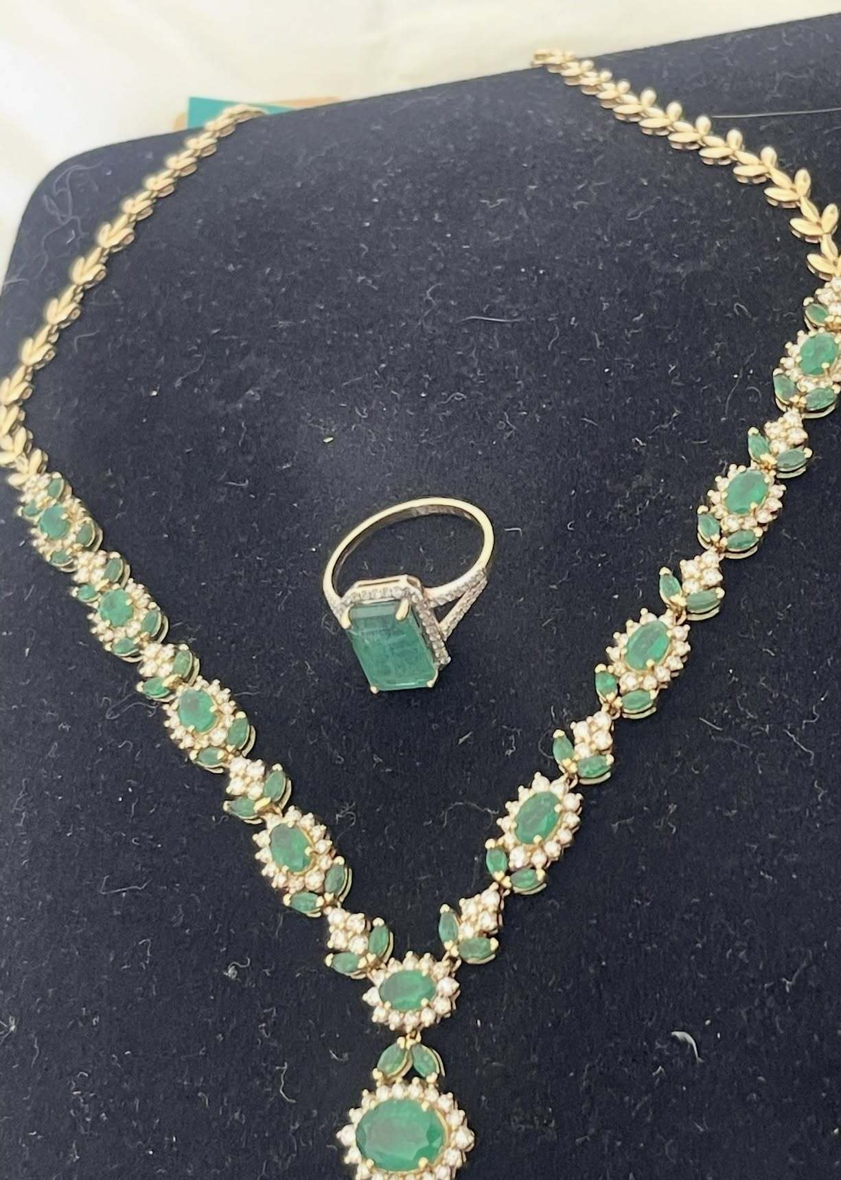 A 14-karat gold necklace and ring, set with diamonds and emeralds, stolen Saturday from an ‘Ewa Beach residence.